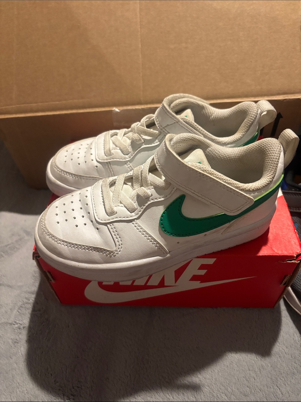 Nike Kids White Sneakers with Green Swoosh